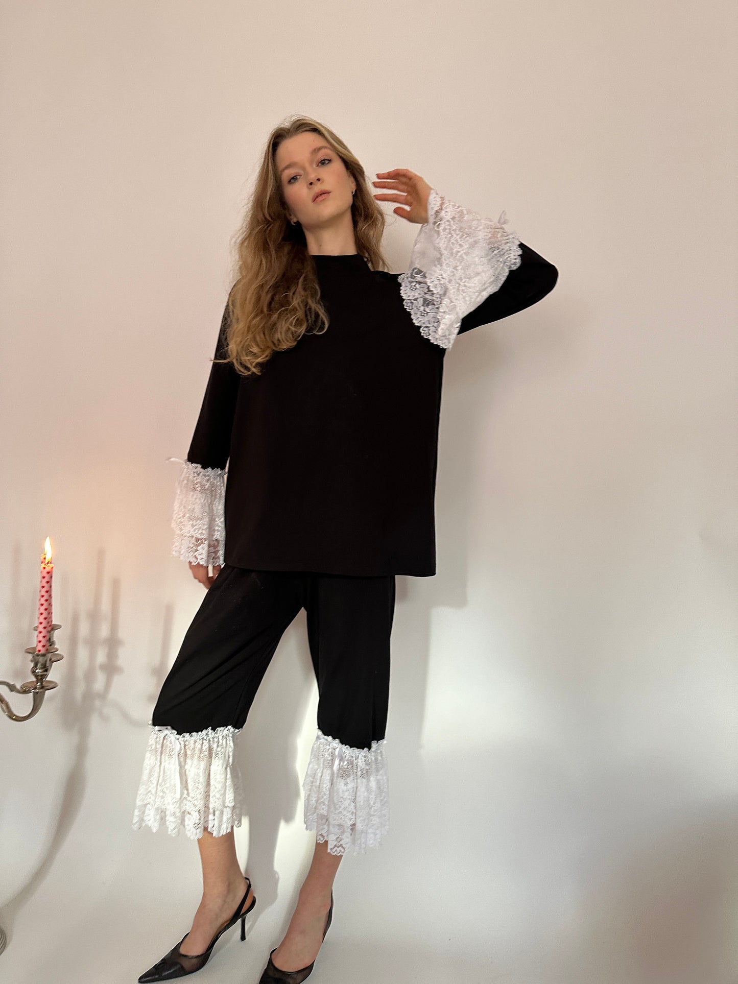 Black jersey white lace capri trousers