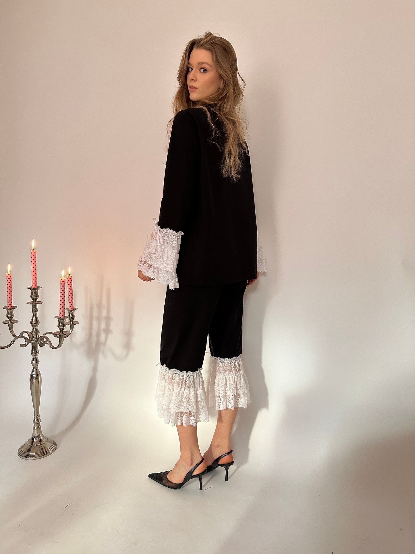 Black jersey white lace capri trousers