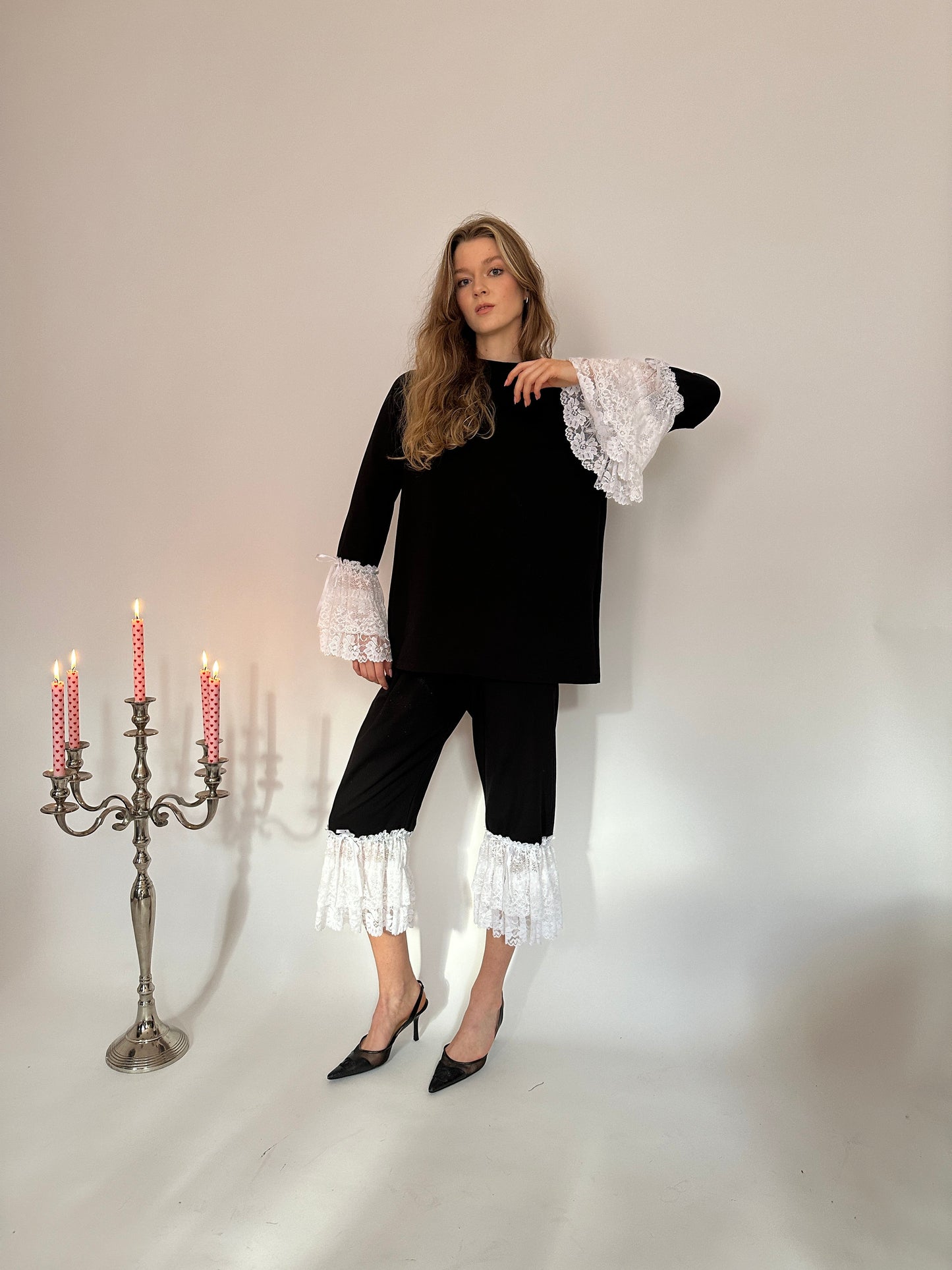 Black jersey white lace capri trousers