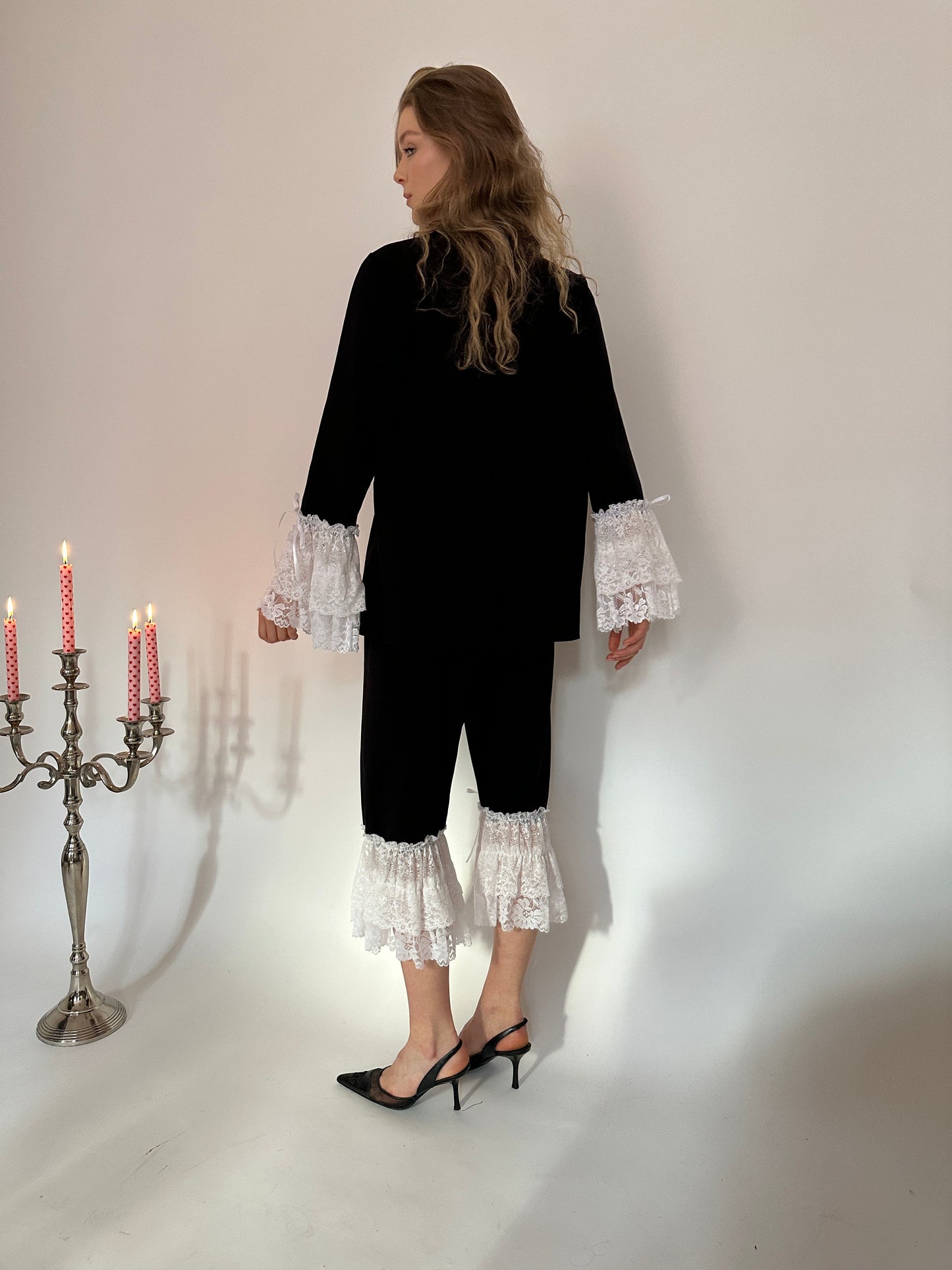 Black jersey white lace capri trousers
