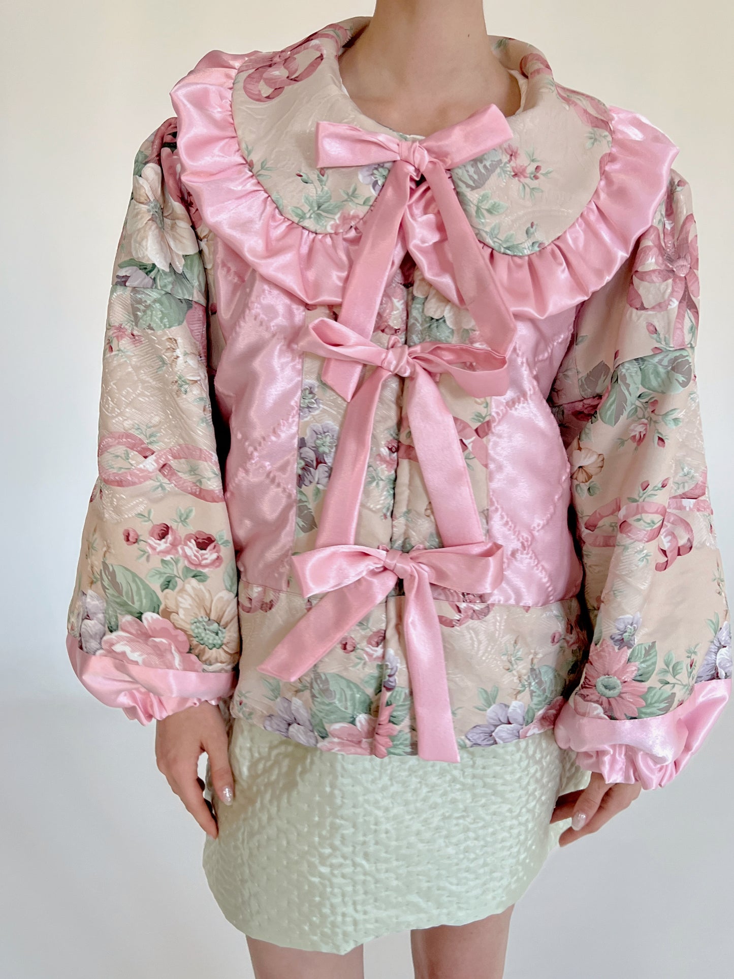 Reworked florals and bows coat