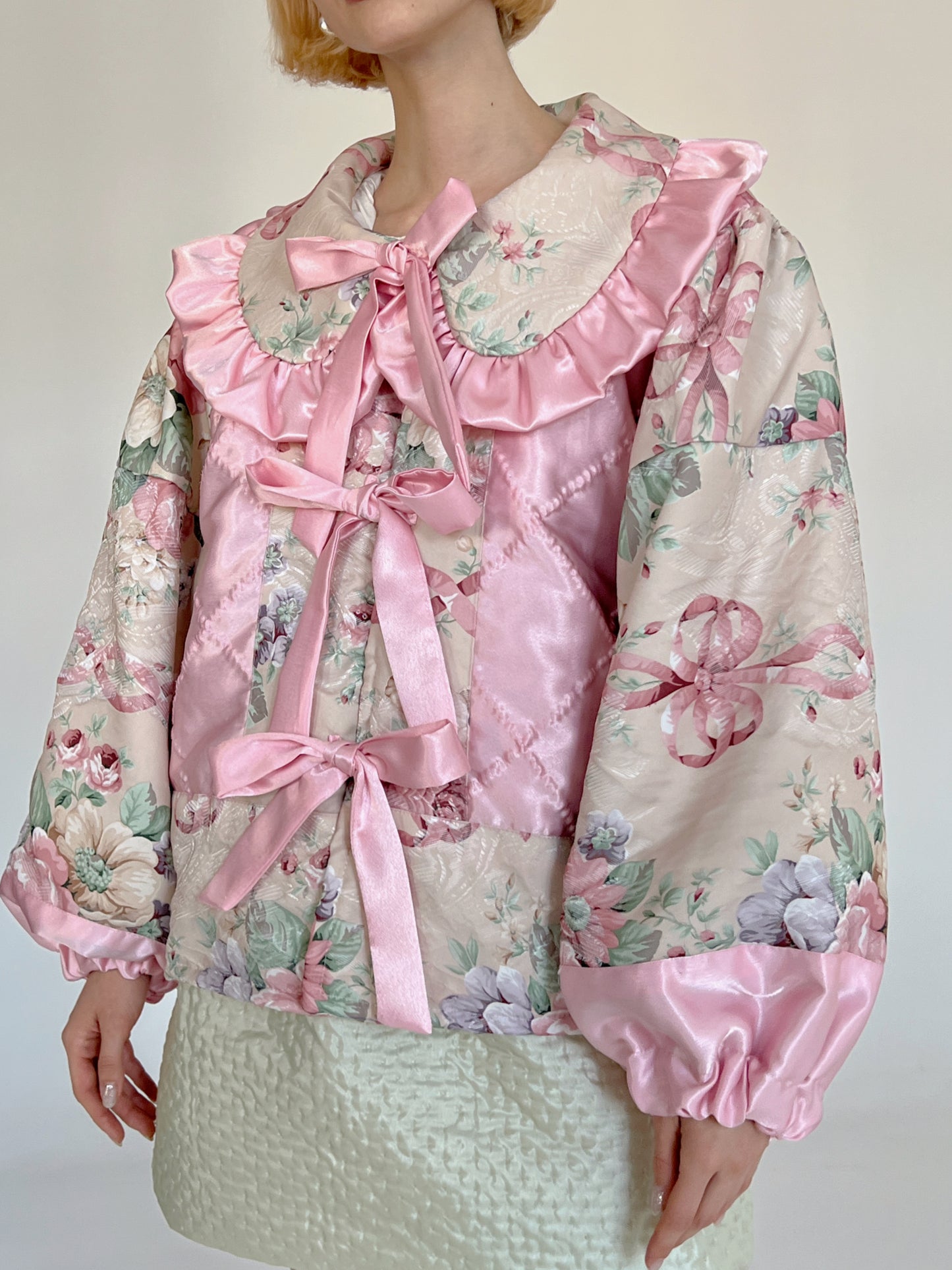 Reworked florals and bows coat